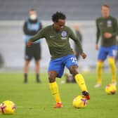 Percy Tau of Brighton and Hove Albion warms up prior to the Premier League match between Manchester City and Brighton & Hove Albion (Photo by Clive Brunskill/Getty Images)