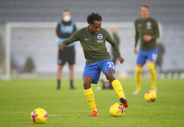 Percy Tau of Brighton and Hove Albion warms up prior to the Premier League match between Manchester City and Brighton & Hove Albion (Photo by Clive Brunskill/Getty Images)