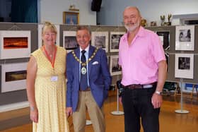 Liz Scott, exhibition organiser, with Cllr Paul Holbrook and Chairman Bruce Broughton-Tompkins. Photo: Hailsham Photographic Society