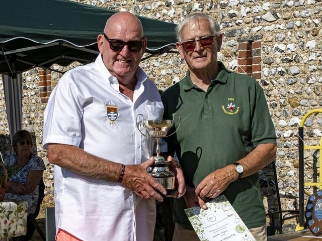 Laurance Pilfold receives the Hanson Cup from Colin Crane at East Preston and Kingston Horticultural Society flower show