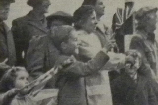 The crowd welcomes Princess Elizabeth outside Worthing Town Hall