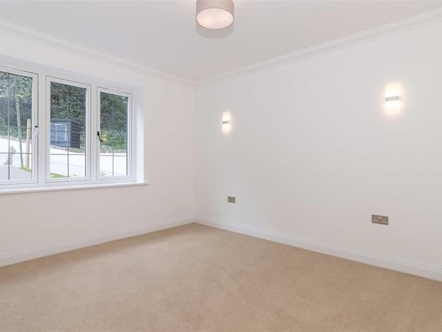 Offers in excess of £900,000 are invited for this new luxury property in Mill Lane, High Salvington. It has beautiful views over the South Downs, versatile and spacious accommodation.