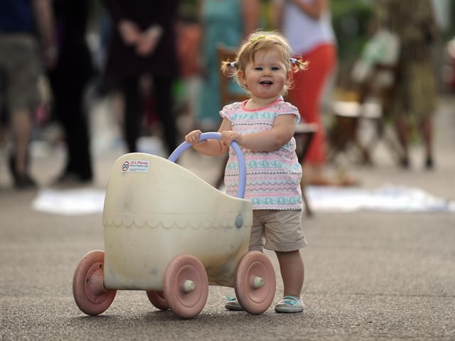 A beaming smile from one of the youngest residents of Whyke Lane in 2014, Autumn Bradley, 16 months
