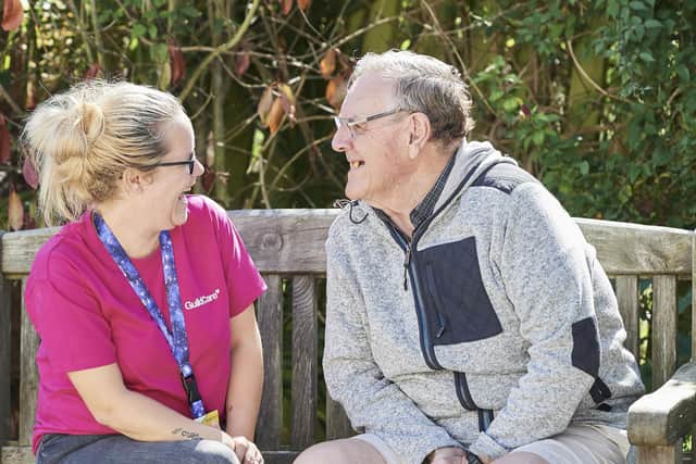 A Guild Care carer with a resident