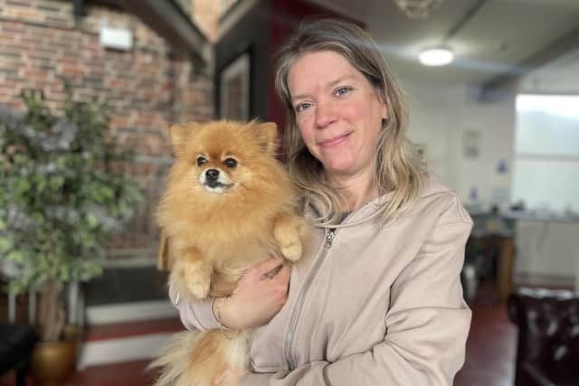 Kathleen Tepperies and Pomeranian Jane who appeared in the 2023 John Lewis Christmas advert. Photo: staff