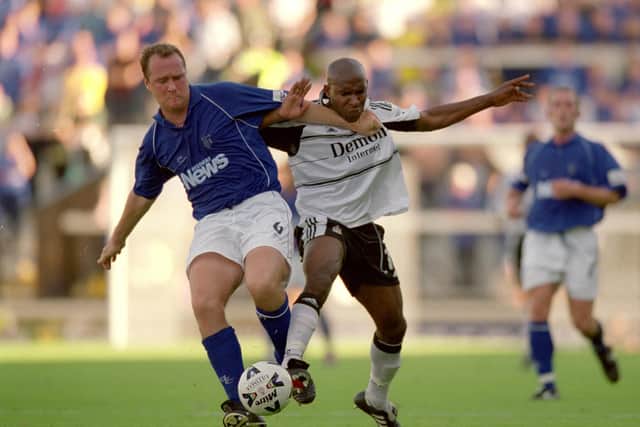 Barry Hayles (right) of Fulham tussles with Guy Butters (left) in his Gillingham days | Picture:: Chris Lobina /Allsport