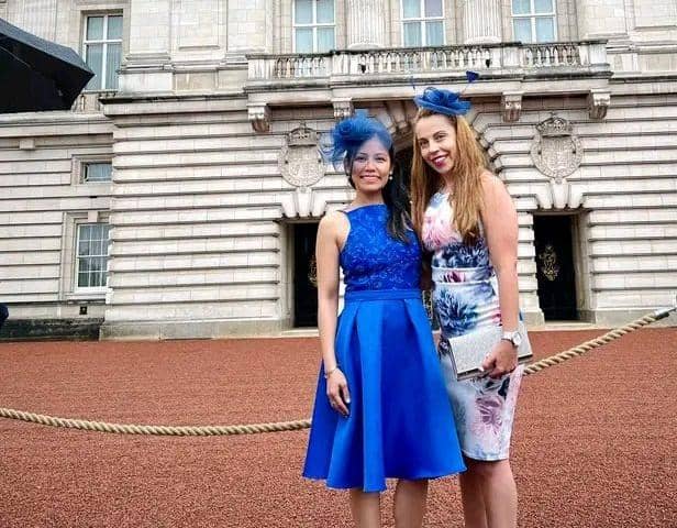 Eloisa and Luisa, Aspen Place Carehome Managers in front of Buckingham Palace