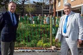 Cllr Paul Marshall (left) and Cllr Neil Parkin (right) with the commemorative stone. Photo: Adur District Council