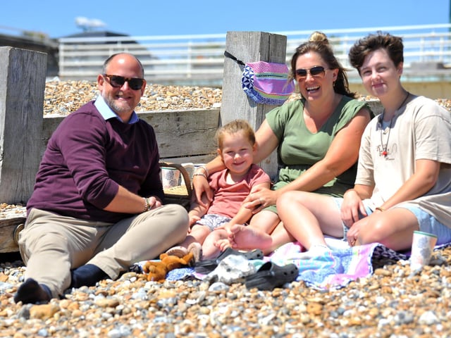 Enjoying the heatwave on Worthing beach. Pic S Robards SR2206152