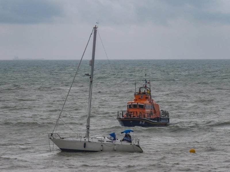 Eastbourne lifeboat approaches the yacht