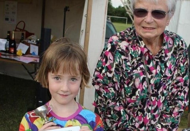 Six-year-old Caitlyn Gledhill won the Belmont Cup as the most successful child and the Frost Junior Cup for her garden in a container