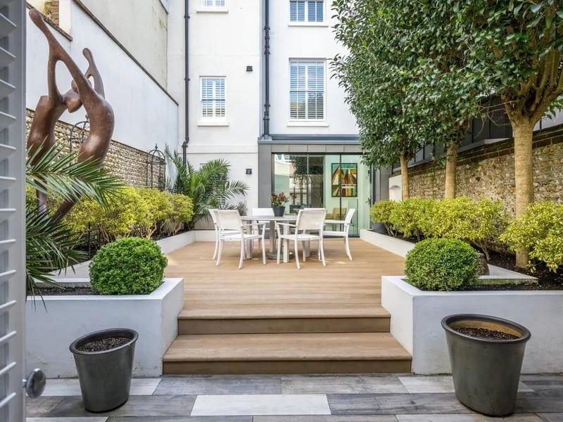 The west-facing garden offers plenty of space and privacy.