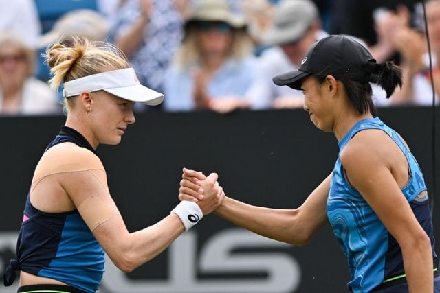Britain's Harriet Dart shakes hands with China's Zhang Shuai after winning their women's singles round of 32 tennis match at the Rothesay Eastbourne International tennis tournament in Eastbourne, southern England, on June 26, 2023. (Photo by Glyn KIRK / AFP) (Photo by GLYN KIRK/AFP via Getty Images):Action from Monday's play at the Rothesay tennis international at Devonshire Park, Eastbourne