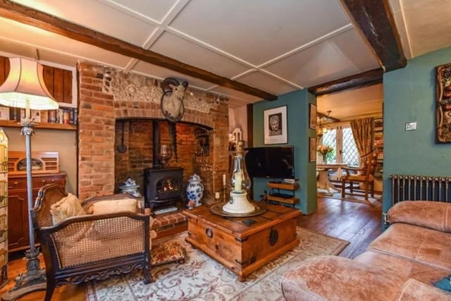 Living room with Inglenook fireplace.
