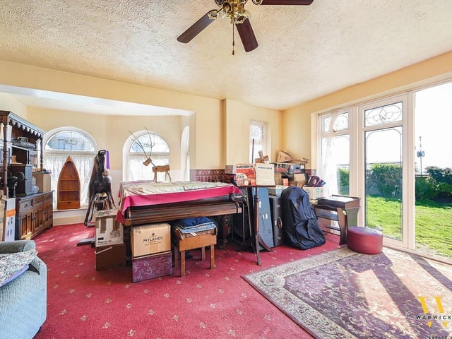 This five-bedroom detached house with direct views of Worthing beach has just come on the market with Warwick Baker at £649,950