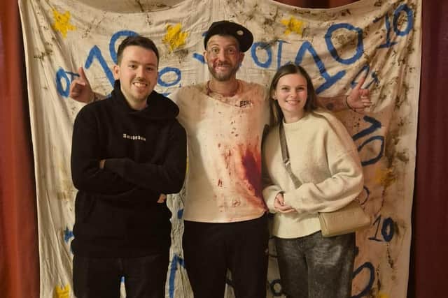 Sam Morton (left) and Maddi Masters (right) took part in the immersive horror experience, created by Davey Ezra (centre).