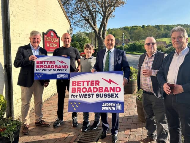 L-R - Richard Champness (Chair Bury Parish Council and community lead for Full Fibre Broadband) celebrates the broadband project success.