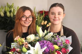 Co owners of the new florist House of Design Flowers on London Road, Burgess Hill, Lauren Dendy and Nancy Hersey, with one of their beautiful bouquets. HR26090901 Pic Hollie Robards/Iconic Media Group