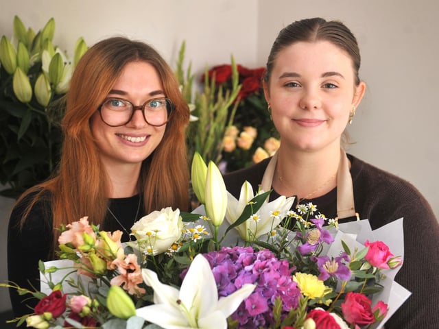 Co owners of the new florist House of Design Flowers on London Road, Burgess Hill, Lauren Dendy and Nancy Hersey, with one of their beautiful bouquets. HR26090901 Pic Hollie Robards/Iconic Media Group