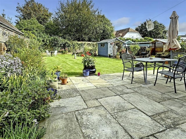 This five-bedroom detached house in a private road has come on the market with Glyn Jones priced at £650,000.
