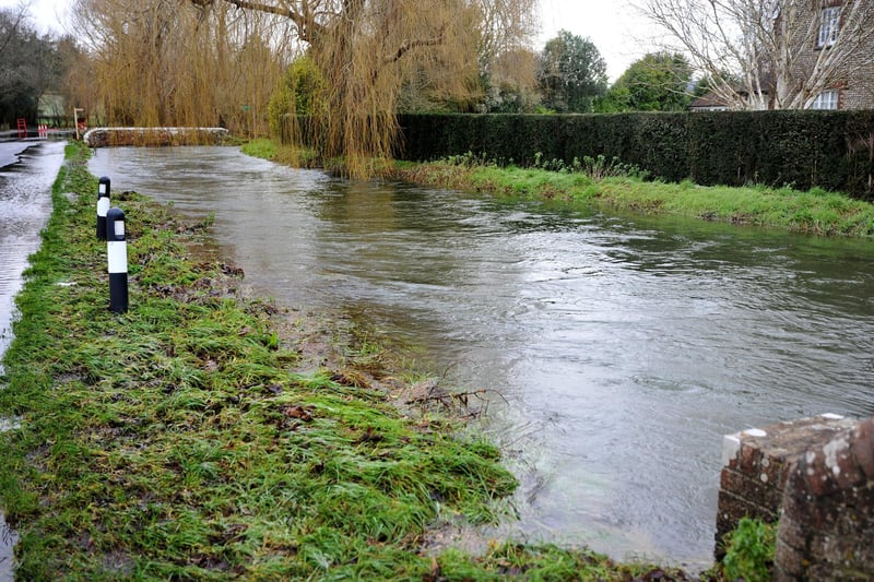 The River Lavant burst its banks leading to flooding in East Lavant Pic S Robards SR23011704