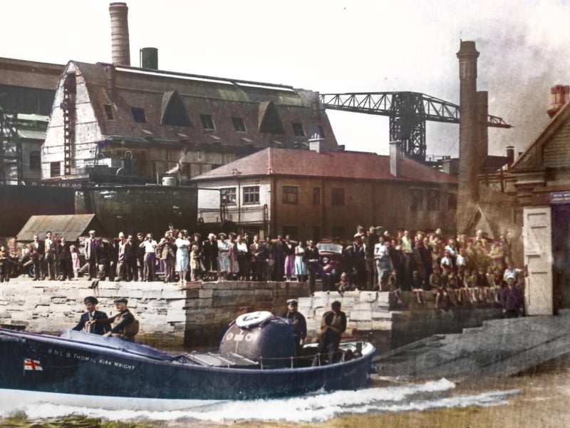Poole lifeboat Thomas Kirk Wright being launched down the slipway at the old Poole lifeboat station, now a museum