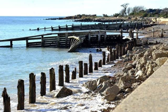 Erosion has uncovered metal parts which can be sharp and wooden structures which pose a trip hazard at Climping.