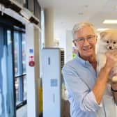Paul O’Grady fans and their dogs have lined the streets for the TV star’s funeral today (Thursday, April 20).