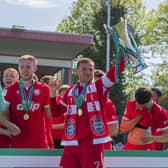 Joel Colbran gets his hands on the National South trophy on Saturday | Picture: Jay Wrighte