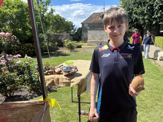 Milo Williamson 12, wins a coconut