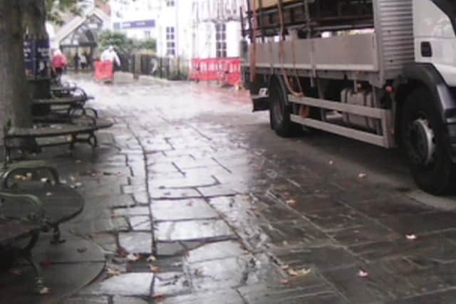 An 86-year-old woman has called for damaged pavements in Horsham to be repaired, saying uneven paving is making life difficult for people who rely on walking frames. Photo: Gwen Holloway