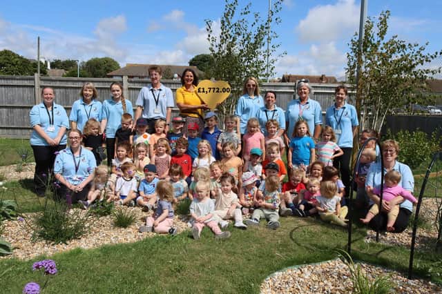 Caroline Roberts-Quigley, community fundraiser at Chestnut Tree House, visited Davison Day Nursery to celebrate the total amount collected. Picture: Davison Day Nursery / Submitted