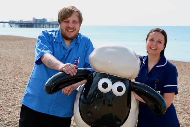 Photo of Martlets Nurses Guy and Jess with Shaun the Sheep