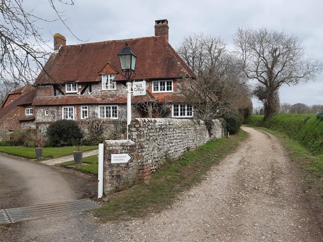 Continue past Mill Cottage on your left and prepare for the wonders of the holloway