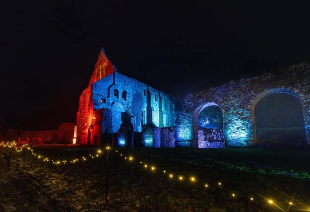 Illuminated Battle Abbey on December 7 2023. Photo by Jim Holden and supplied by English Heritage.