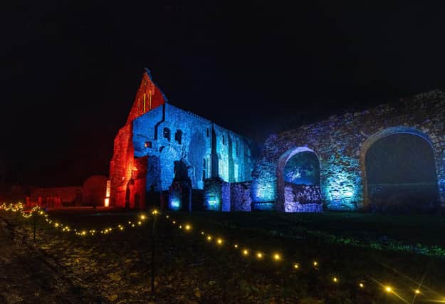 Illuminated Battle Abbey on December 7 2023. Photo by Jim Holden and supplied by English Heritage.