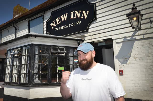 The New Inn in Sidley will reopen on Good Friday after the fire there in November 2024. Pictured: Lewis Collins, who is one of the landlords along with his partner Zoe Henderson.
