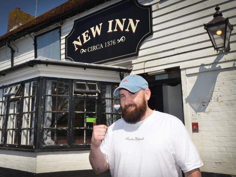 The New Inn in Sidley will reopen on Good Friday after the fire there in November 2024. Pictured: Lewis Collins, who is one of the landlords along with his partner Zoe Henderson.