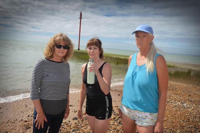 Water testing in St Leonards after recent sewage discharges in the area. L-R: Clean Water Action supporters Jackie Innes, Councillor Amanda Jobson and Angela Gunning.