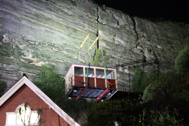 Easy does it - a carriage is lowered down from the cliff railway