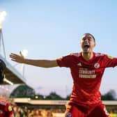 Crawley Town beat MK Dons 3-0 in the first leg of their League Two play-off semi-final at the Broadfield Stadium. Here are Eva Gilbert's pictures from the game.