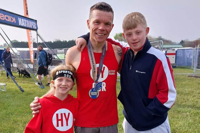 Ivy, Barry and Little John from the HY Runners OCR team