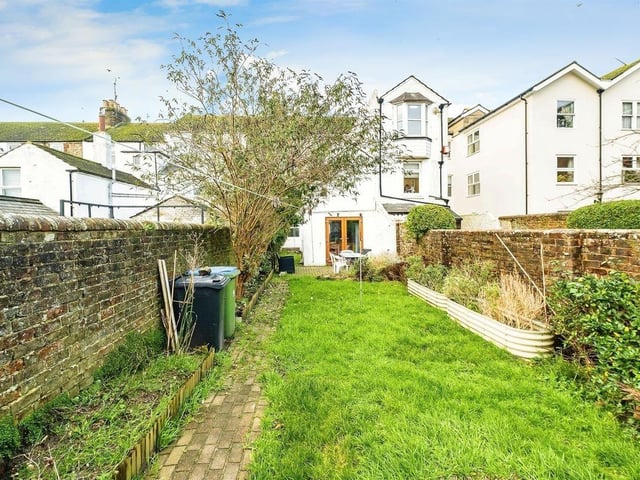 This five-bedroom townhouse near Littlehampton beach has just come on the market with Fox and Sons priced at £475,000. There is spacious accommodation over three floors plus a cellar.