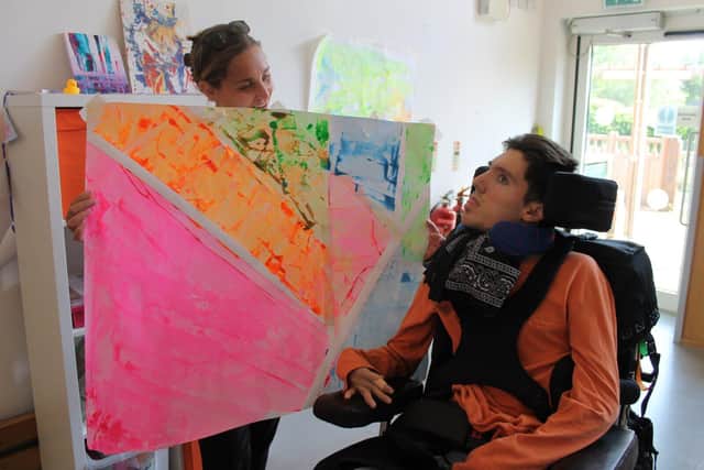 Rosie & Jacob working with art therapy.
