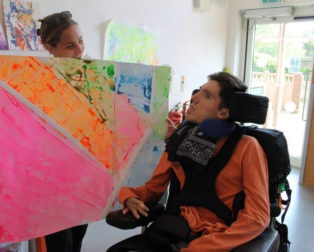 Rosie & Jacob working with art therapy.