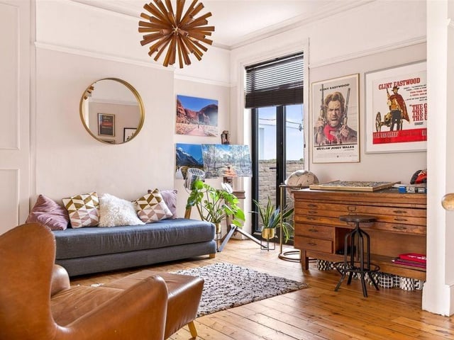 The spacious sitting room offers ample room