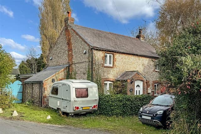 This extended 19th century cottage with large garden and heated summerhouse has come on the market in Littlehampton