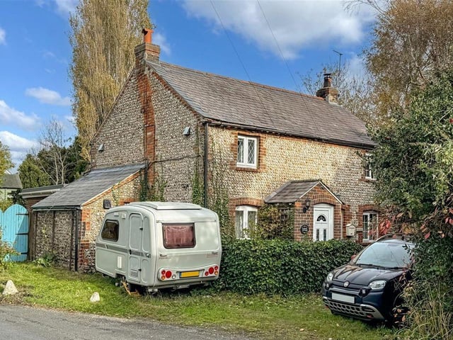 This extended 19th century cottage with large garden and heated summerhouse has come on the market in Littlehampton