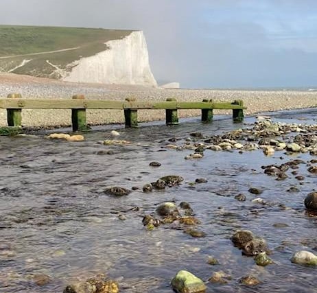 Karen Bailey sent us this tranquil image of the first of the Seven Sisters rising from the river mouth at Cuckmere Haven. The picture was taken with an iPhone.