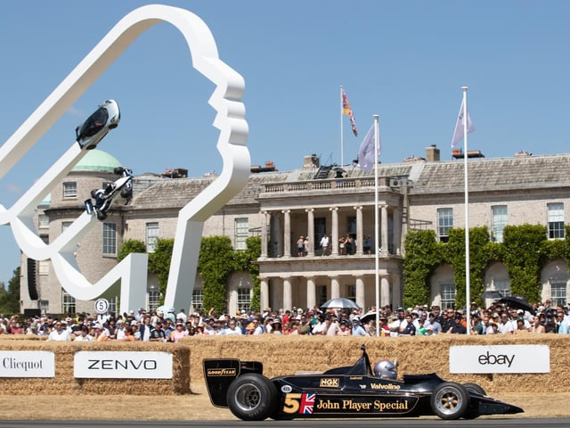 A Team Lotus car speeds round the racecourse. Photo: Michael John Reed.
